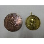 A large bronze French 1900 Exposition Universelle Internationale medallion and a brass Michael