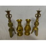 A pair of Chinese style brass pricket candlesticks with tapered stems,