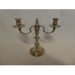 A good quality Georgian style silver two branch candelabrum with detachable arms on baluster column