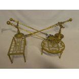 A brass companion set (af) with fire dogs and two kettle stands