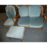 A 1960's Ercol open arm two seat settee with blue upholstered cushions together with matching open