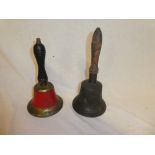 A old brass hand bell with turned wood handle and one other damaged hand bell (2)