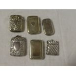Six various electro-plated rectangular vesta cases with engraved and raised decoration