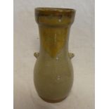 A Chinese pottery brown glazed two-handled tapered vase, 10" high,