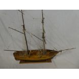 A wooden scale-built model of a two masted sailing ship "Le Hussard" 26" long
