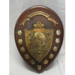An unusual silver-plated presentation sports shield " Rosely Shield",