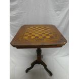 A 19th Century inlaid walnut square occasional table with inset games board top on turned column