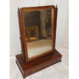 A mid 19th Century mahogany rectangular toilet mirror with gilt slip,
