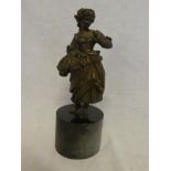 A 19th Century bronze figure of a classical female 7½" high on black marble plinth