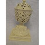 A 19th Century Leeds creamware circular pedestal pot pourri and cover with pierced decoration on