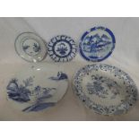An 18th Century Chinese circular charger with blue & white landscape decoration,