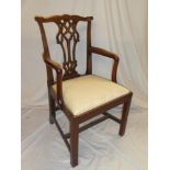 A 19th Century mahogany Chippendale-style carver armchair with pierced vase spat-back and