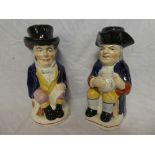 Two 19th Century Staffordshire pottery toby jugs depicting a gentleman in a top hat and a gentleman