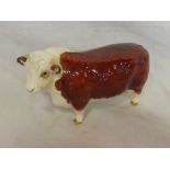 A Beswick china figure of a Hereford bull "Ch of Champions"