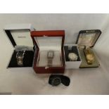 A selection of gents' wristwatches including stainless steel gent's wristwatch by DKNY,