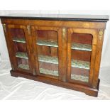 A 19th Century walnut & ebonised rectangular display cabinet with adjustable shelves enclosed by