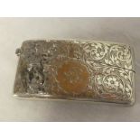 An Edward VII silver rectangular concave visiting card case with hinged lid and engraved decoration,