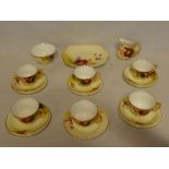 A Royal Worcester china part tea set with painted fruit and flower decoration by K Blake,