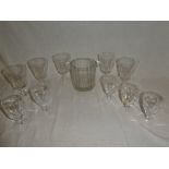 A glass two handled Champagne holder by Moet & Chandon and two part sets of five stemmed wine