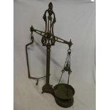 An old iron and brass balance scales by N Mark & Son of Liverpool