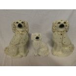 A pair of Staffordshire pottery seated Spaniel figures,