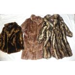 Three various ladies fur coats