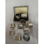 Six various silver napkin rings, cased pair of damaged silver napkin rings and others,