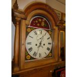 A 19th Century longcase clock with 12" painted arched dial,