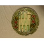 A Longchamp pottery majolica glazed circular asparagus dish with raised decoration