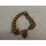 A 9ct gold chain link bracelet with 9ct padlock clasp