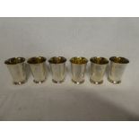 A set of six silver tapered beakers, 3¼" high,