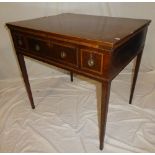 A 19th Century mahogany crossbanded writing table with three drawers in the frieze on square