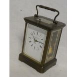 A good quality carriage clock by Matthew Norman of London with striking movement in brass