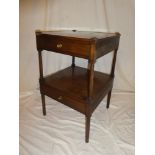 A 19th Century mahogany two tier night stand with two small frieze drawers on turned supports