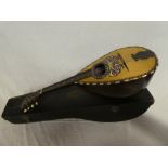 An old mandolin by Stridente of Naples in inlaid rosewood case and fibre carrying case