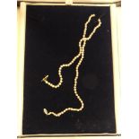 A good quality pearl necklace with gilt clasp,