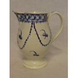 An 18th Century china tapered pedestal jug with blue & white painted decoration (slight damage),