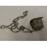 A ladies Continental silver folding fob watch in square case together with silver plated chain