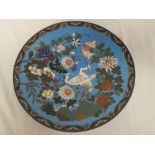 A Japanese Cloisonne enamelled circular shallow bowl with crane and floral decoration on pale blue