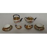 A Royal Crown Derby miniature china tea for two set comprising tea kettle with blue,