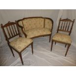 A 19th Century ornate Continental carved walnut two-seat salon settee with floral upholstery on