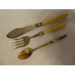 A pair of Victorian silver fish serving implements with engraved decoration and bone handles,