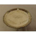 A George V silver waiter tray with decorated edge and engraved inscriptions, London marks, 1910,