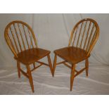 A set of four 1960's/70's elm & beech spindle back kitchen/dining chairs by Inglesants of Leicester