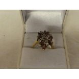 A 9ct gold red & white stone cluster dress ring