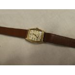 A Rone sportsmans gentleman's 9ct gold wristwatch with rectangular dial and leather strap