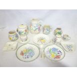 A selection of various Poole pottery including floral tapered jug, biscuit barrel, various vases,