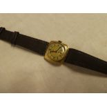 A gentleman's 9ct gold wristwatch by Tudor with leather strap
