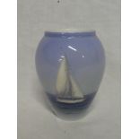 A Royal Copenhagen china tapered vase with sailing yacht decoration 5" high