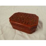 An Eastern cinnabar lacquer rectangular table box with floral decoration,